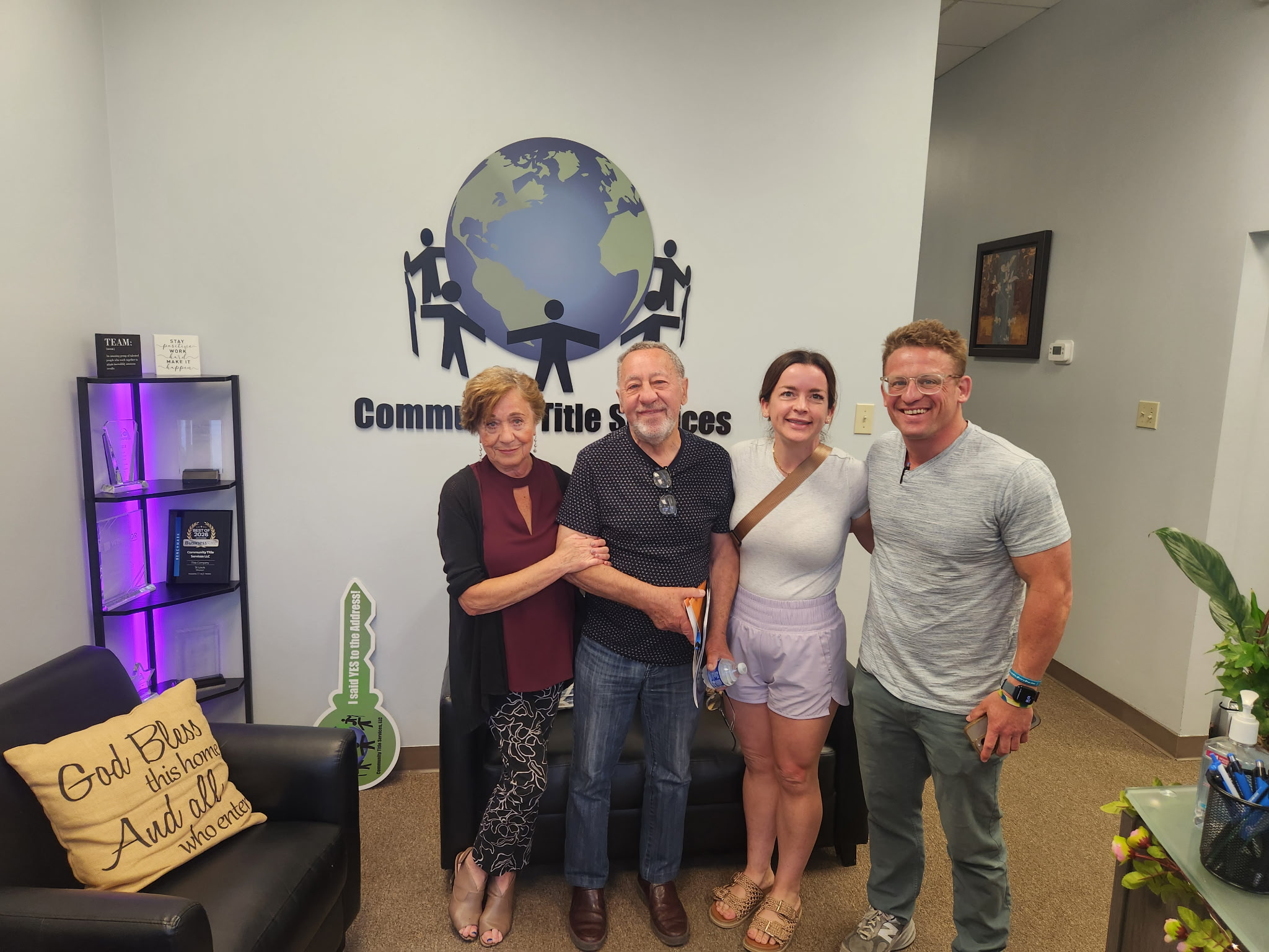 Nikolay and Emma with Brad and Sara at closing